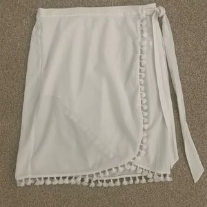 J Crew white swimsuit coverup with pompoms.